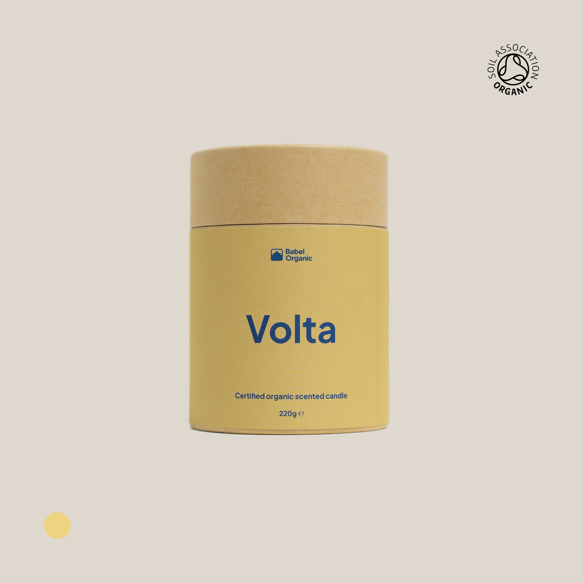 Volta yellow certified organic candle packaging on a beige background